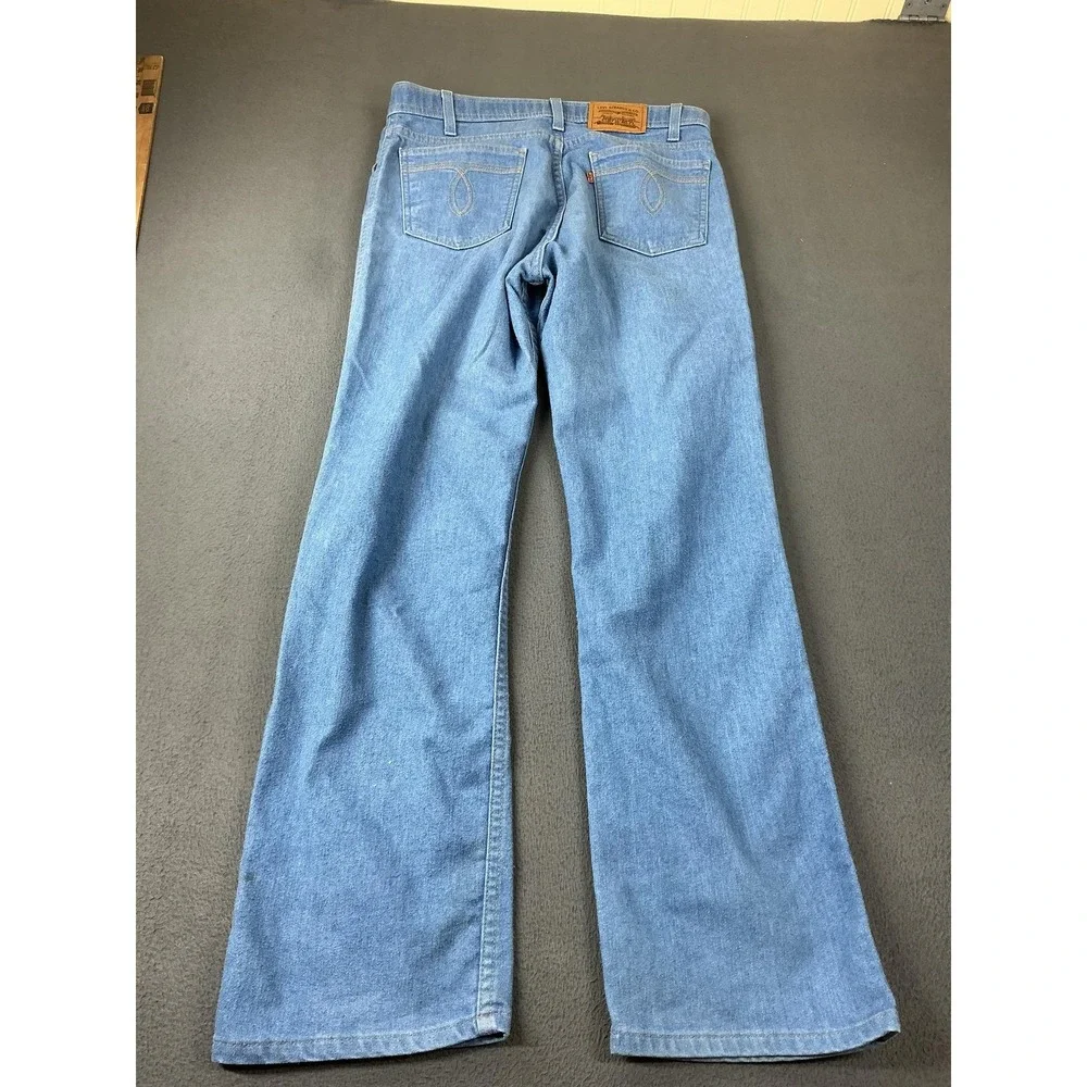 Vintage Levi's Action Jeans Mens 34x31 Light Wash Blue Bootcut Relaxed USA